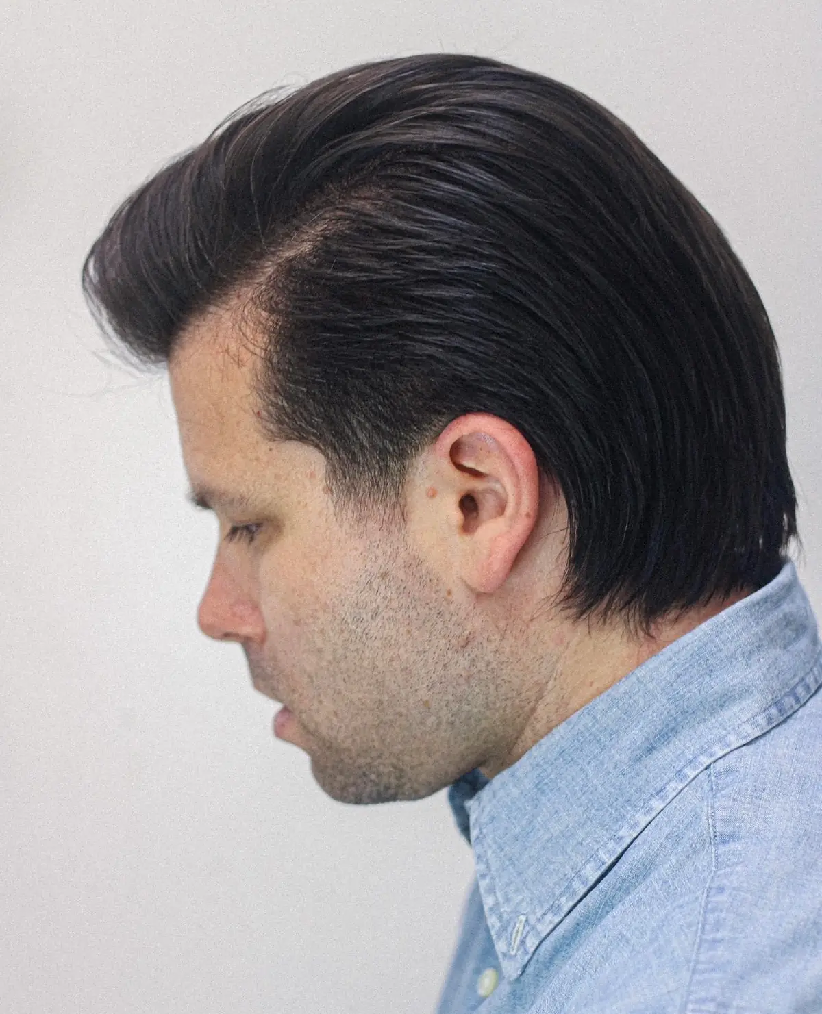 Classic slick-back haircut by RUCI.BARBER, Cranbourne's private studio barber